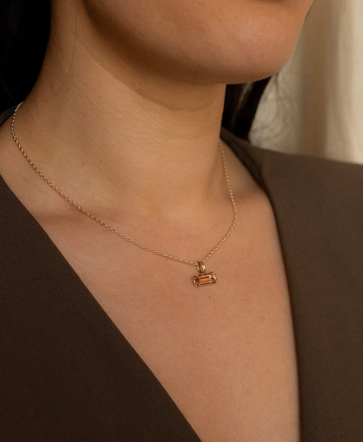 Close up of the One of a Kind Charm 491 worn on a fine belcher chain.
