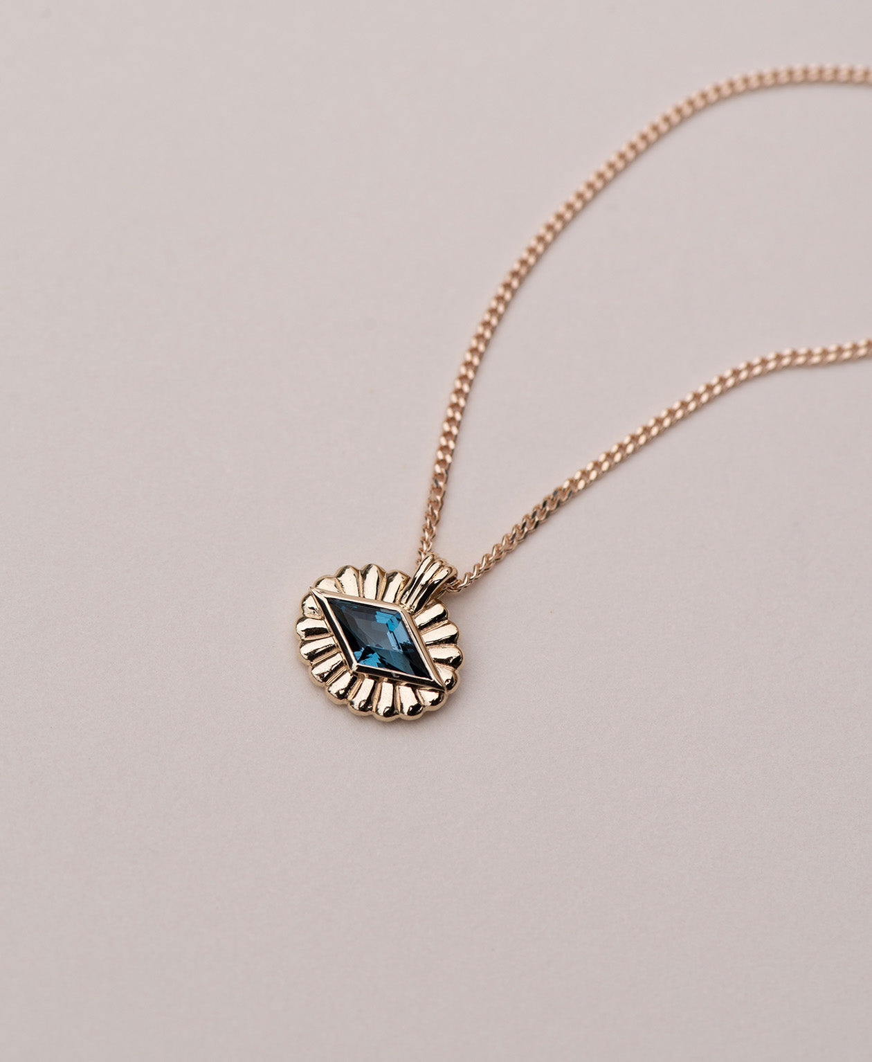 Limited Edition 192 - 9k Yellow Gold, Blue Topaz