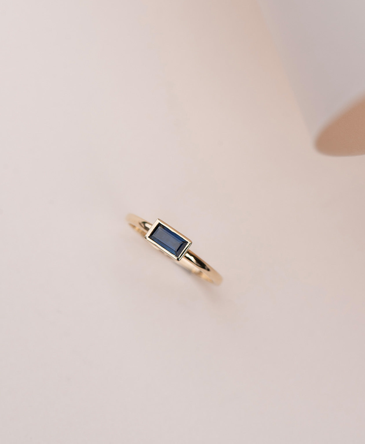 Mon Petit Stacker Ring - 9k Yellow Gold, Baguette Cut Blue Sapphire