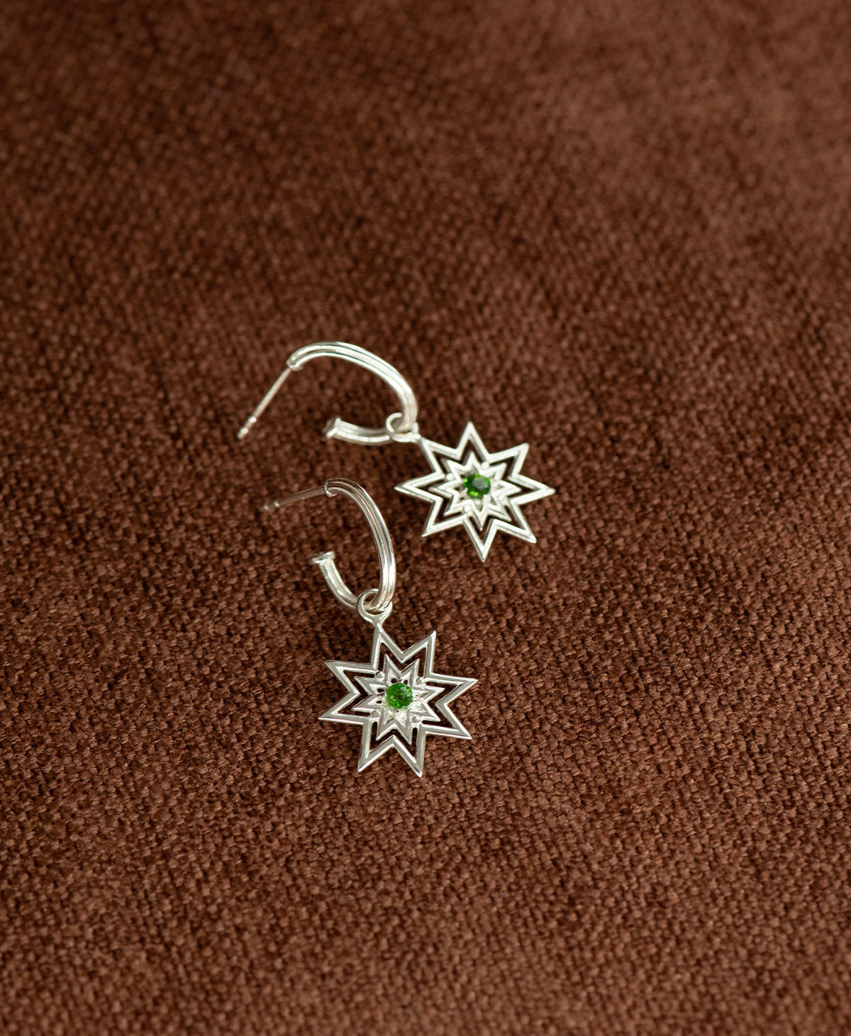 Close-up of the Nora Hoops in 925 Sterling Silver with Chrome Diopside.