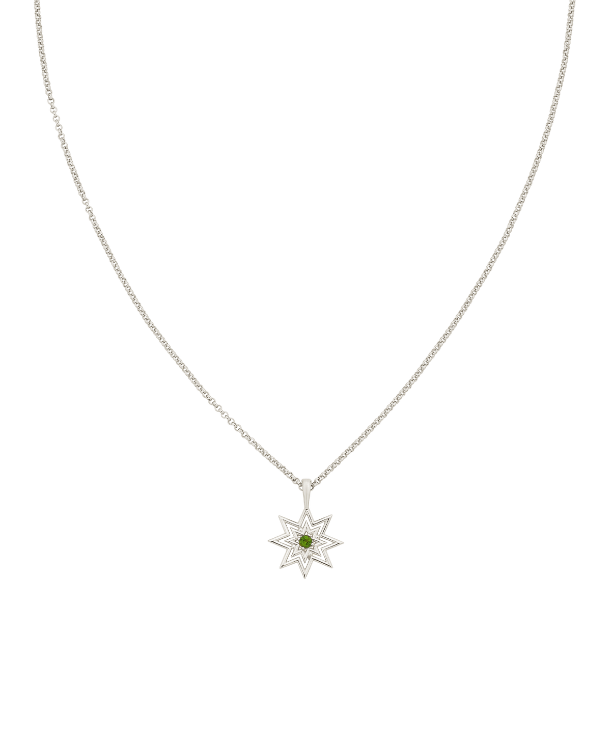 A clearcut of the Nora Necklace, a silver eight pointed star pendant with a central green stone.