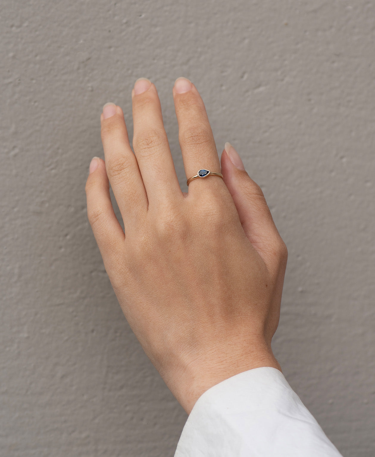 Mon Petit Stacker Ring - 9k Yellow Gold, Pear Cut Blue Sapphire