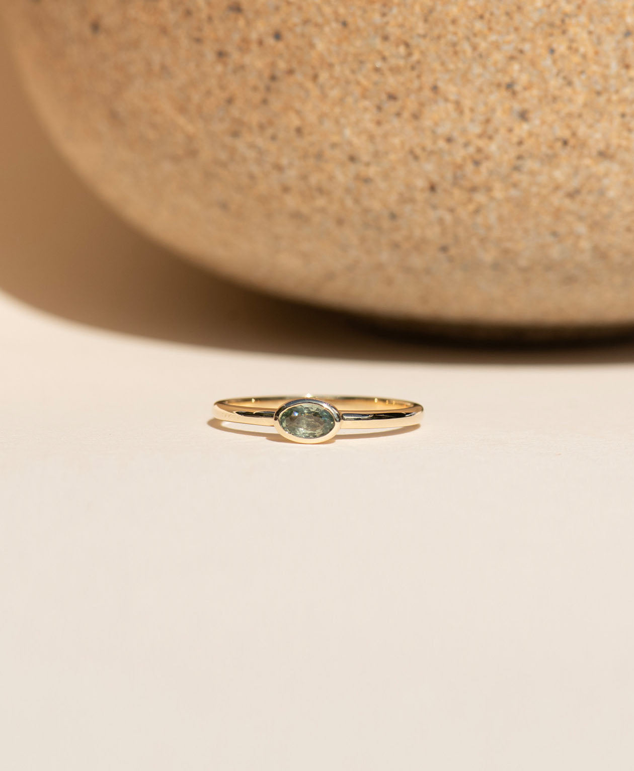 Mon Petit Stacker Ring - 9k Yellow Gold, Oval Cut Green Sapphire